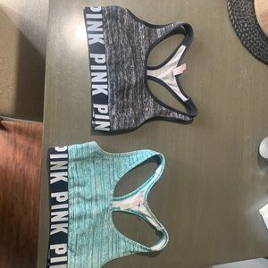 Two VS pink sports bras